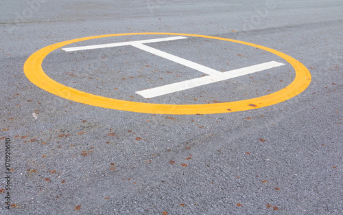 symbol landing pad. helicopter parked mark on the asphalt © pramot48