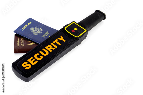 metal scanner with thailand passport, usa passport on isolated white background