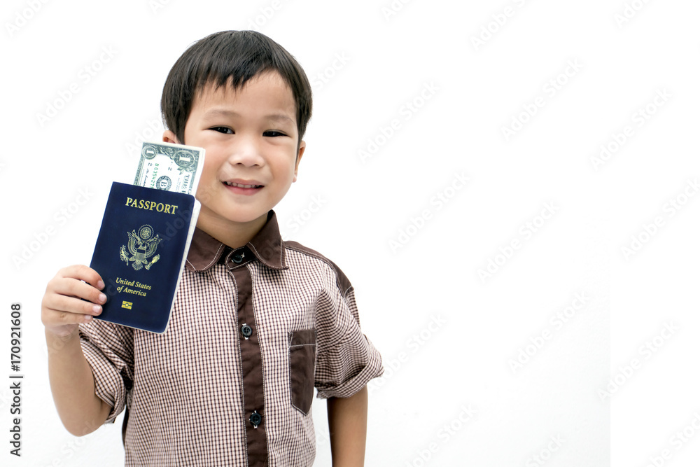 Handsome School Age Boy holding US Passport looking at camera wearing checkered isolated on white background Handsome School Age Boy holding US Passport looking at camera wearing checkered isolated on white background