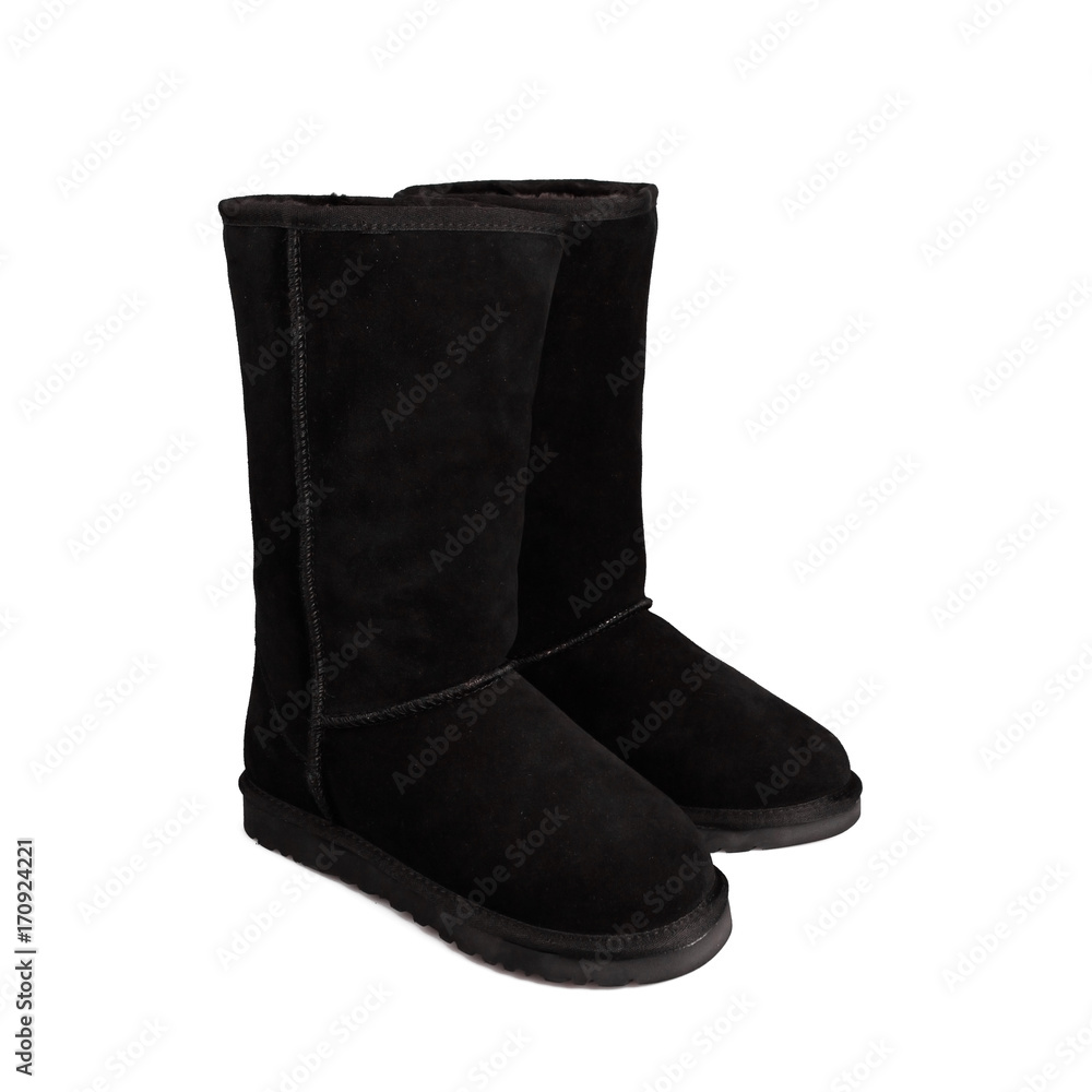 black winter boots isolated on white background black winter boots isolated on white background