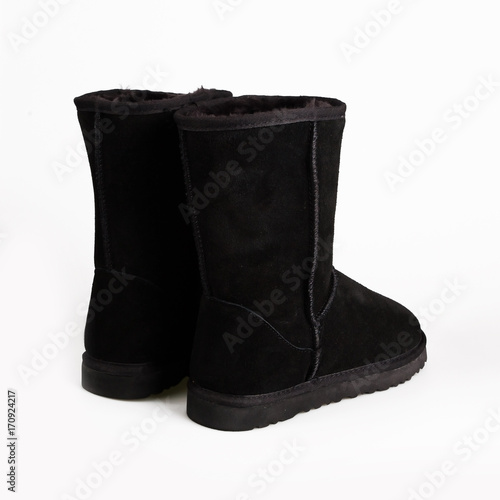 black winter boots isolated on white background