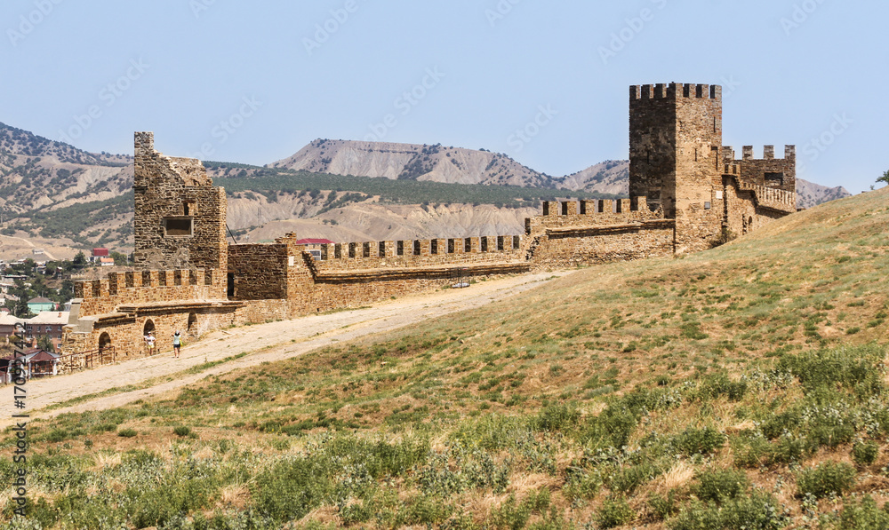 An ancient wall with towers.