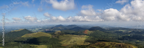 the famous Puy-de-D  me  volcano of Auvergne which dominates the city of Clermont-Ferrand