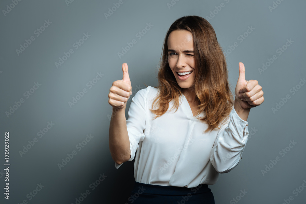 Happy delighted woman showing optimism Happy delighted woman showing optimism