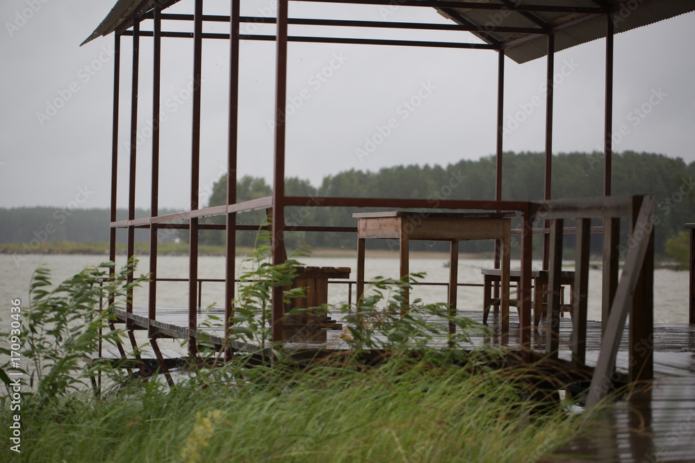 Fototapeta premium Wooden pier after the rain