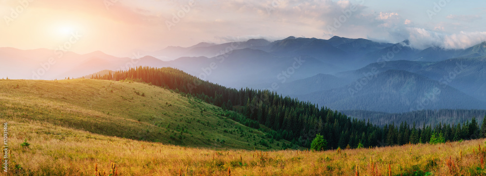 Fototapeta premium Sunset in the mountains landscape. Dramatic sky. Carpathian, Ukraine, Europe. Beauty world.