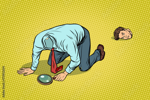 The man lost his head. Looking with a magnifying glass