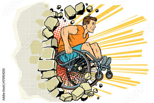 Caucasian male athlete in a wheelchair punches the wall