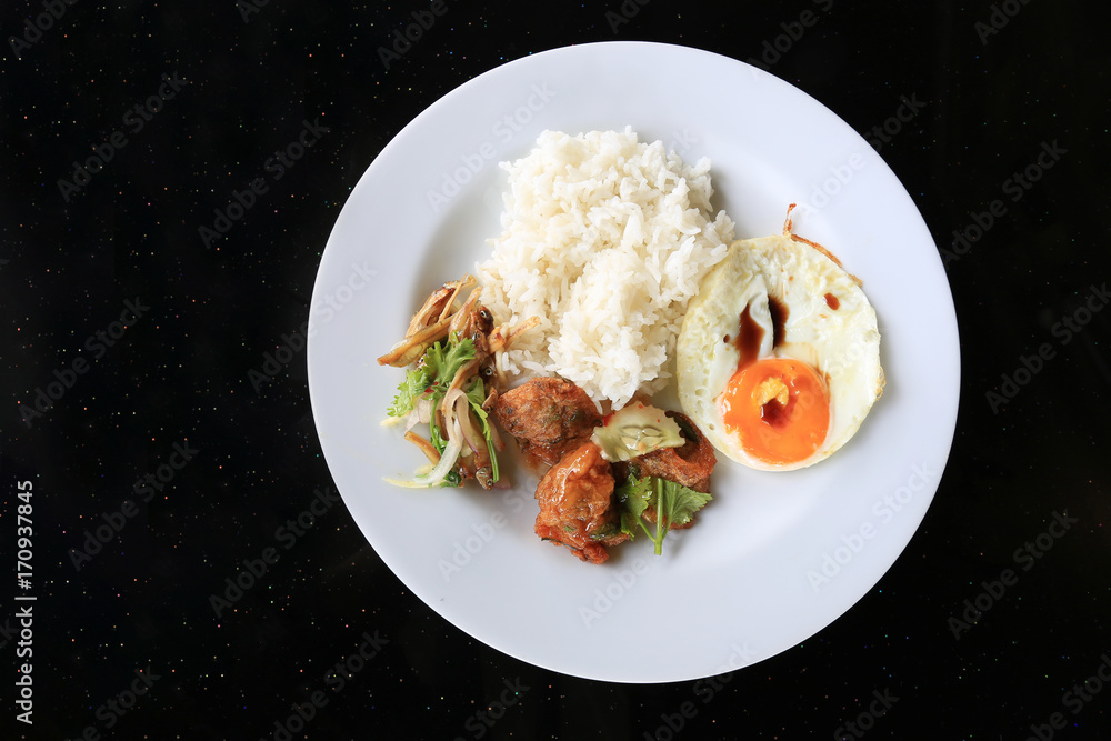 Fried egg and fish salads eat with jasmine rice. Fried egg and fish salads eat with jasmine rice.