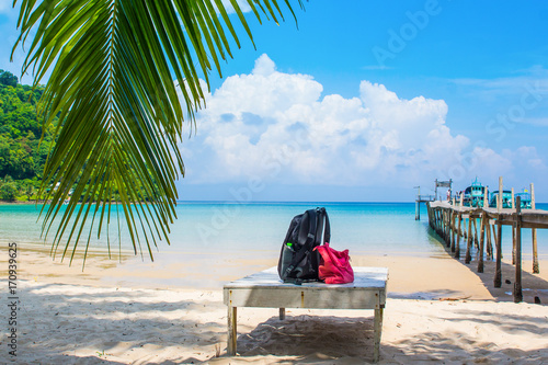 Bag on a tropical beach,summer vacation concept.
