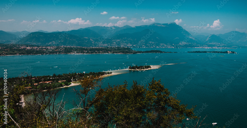 Obraz premium panoramic view of Garda Lake, Italy, low visibility,