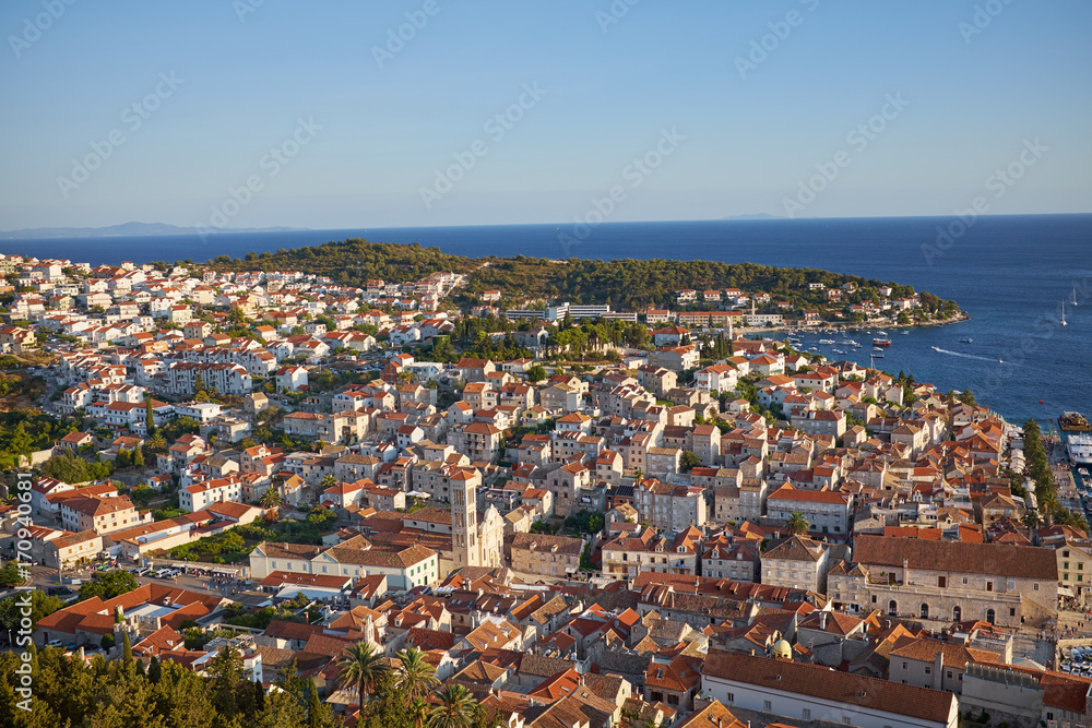 Harbor of old Adriatic island town Hvar. High angle panoramic view. Popular touristic destination of Croatia.