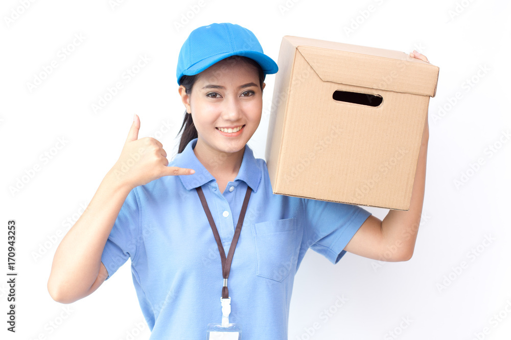 Young Asian Woman with Delivery service worker in uniform. Woman holding Box with attractive smiling isolated on white background. Young Asian Woman with Delivery service worker in uniform. Woman holding Box with attractive smiling isolated on white background.