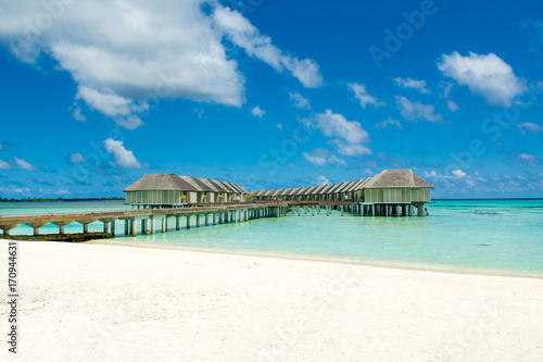 Wooden villas over water of the Indian Ocean  Maldives