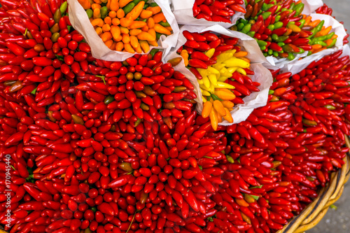 fresh red chili peppers at the market photo