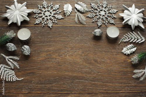 Decorative Christmas composition on wooden background.