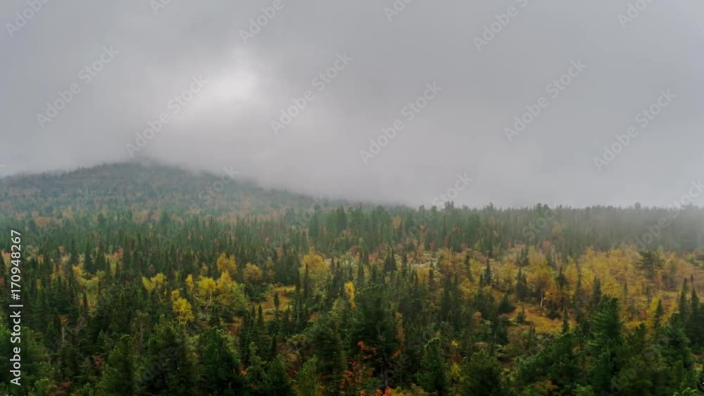 Fog and clouds over rocks and forest in the mountains in autumn. 4K time lapse.
Fog and clouds over rocks and forest in the mountains in autumn. 4K time lapse.