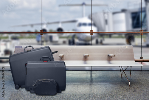 Empty seats and luggage in a Airport photo