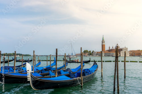 Traditional gondolas and San Giorgio Maggiore, Venice Italy