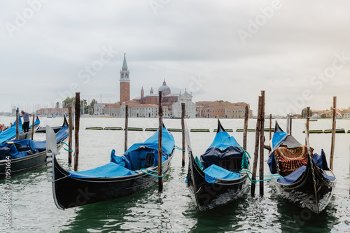 Traditional gondolas and San Giorgio Maggiore, Venice Italy © luili