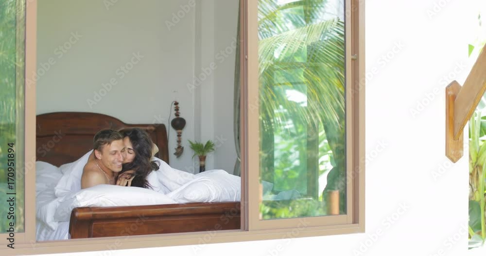 Couple In Bed Kissing Under Blanket, Lovers Bedroom Happy Young Man And Woman In Love Honeymoon Slow Motion 60 Couple In Bed Kissing Under Blanket, Lovers Bedroom Happy Young Man And Woman In Love Honeymoon Slow Motion 60