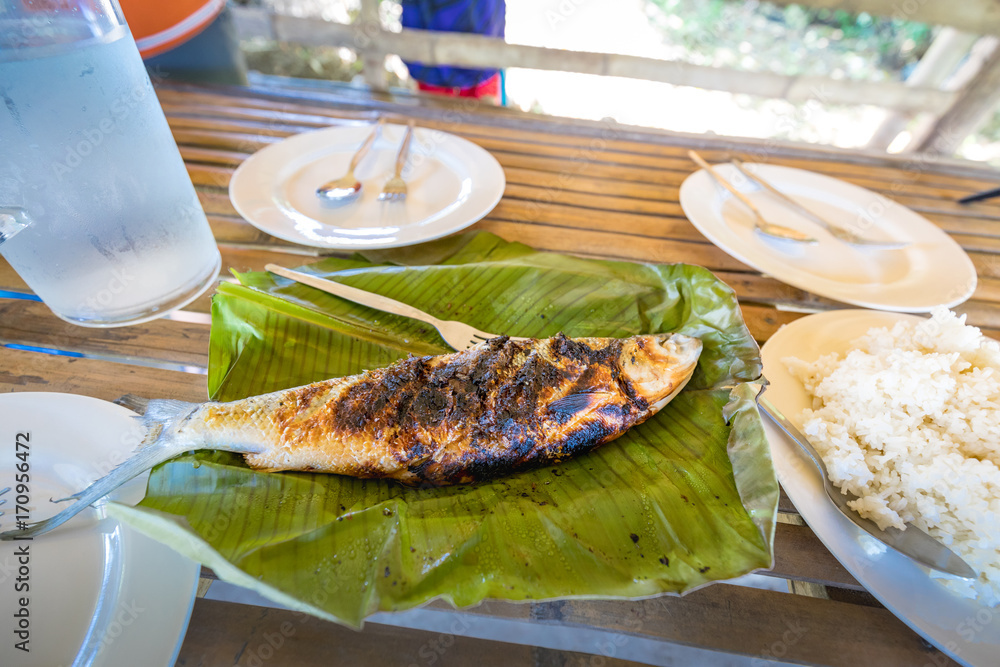 Filipino favorit fish grilled bangus - Milkfish Stock Photo | Adobe Stock