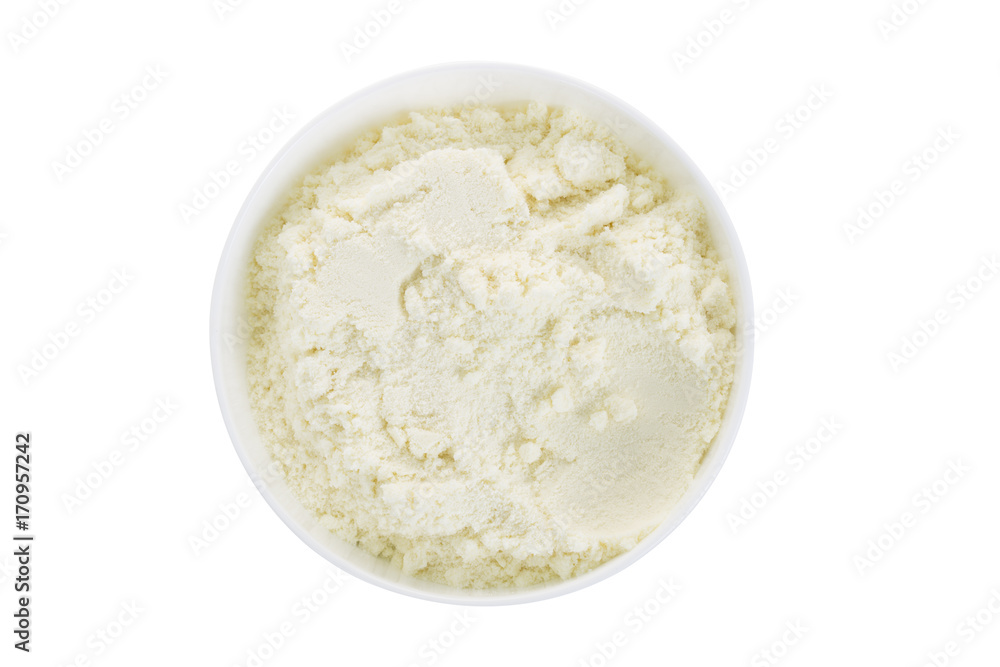 Closeup of powder milk in a white bowl. Top view. Closeup of powder milk in a white bowl. Top view.