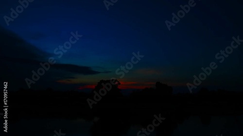 Wallpaper Mural sunrise in sky cloud river reflex beautiful and silhouette forest.  Time Lapse VDO 4K Torontodigital.ca