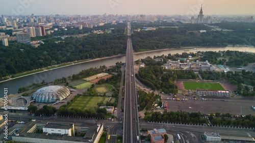 sunset evening moscow cityscape stadiumriver traffic bridge university aerial panorama 4k time lapse russia
