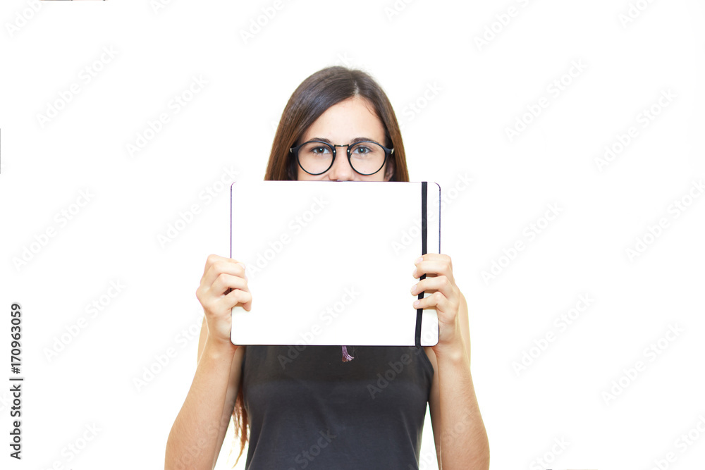Young beautiful woman in glasses on white isolated background holds notebook teacher emotions Young beautiful woman in glasses on white isolated background holds notebook teacher emotions