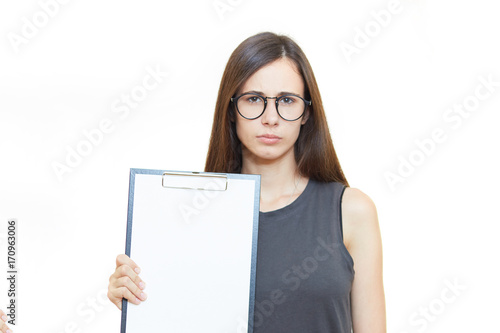 Smiling business woman holding pads of notepaper on white background