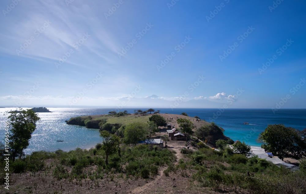 Beautiful landscape with volcanic mountains on the horizon, Lombok Island, Indonesia