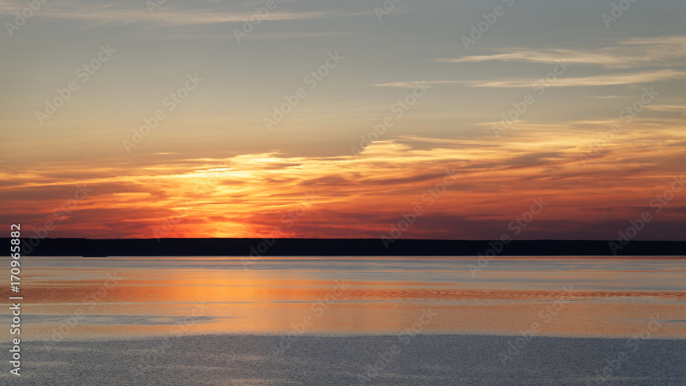 Summer sunset on the river. Backdrop or background.