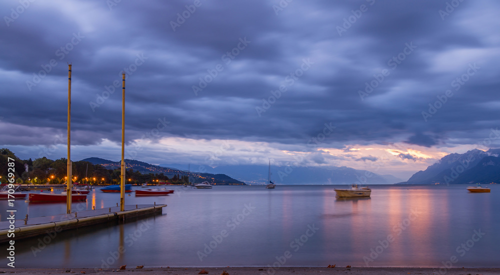 Sunrise on Leman lake and boats