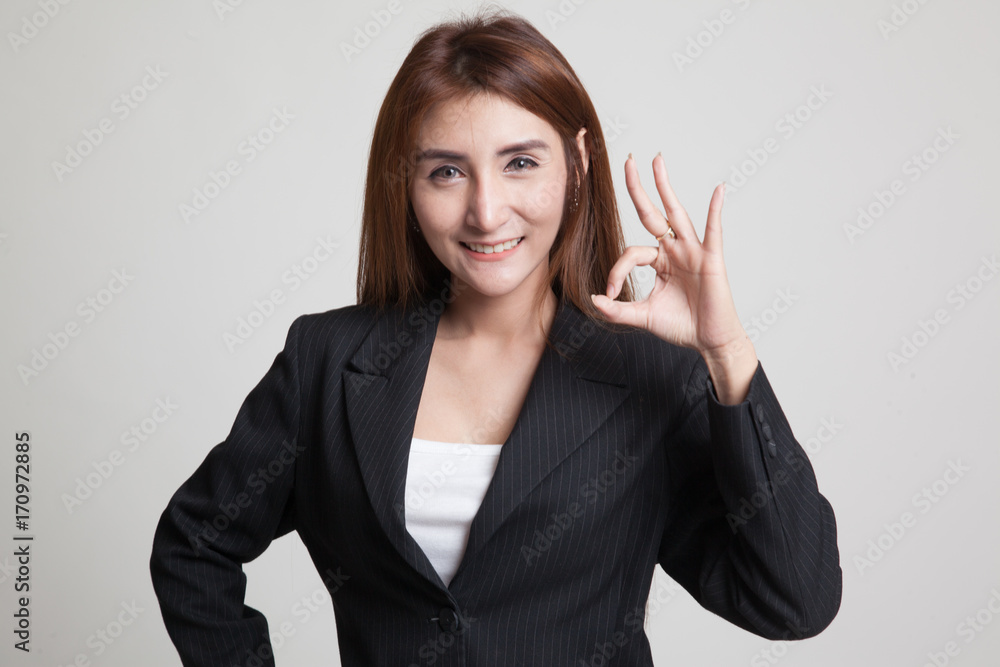 Young Asian woman show OK sign. Young Asian woman show OK sign.