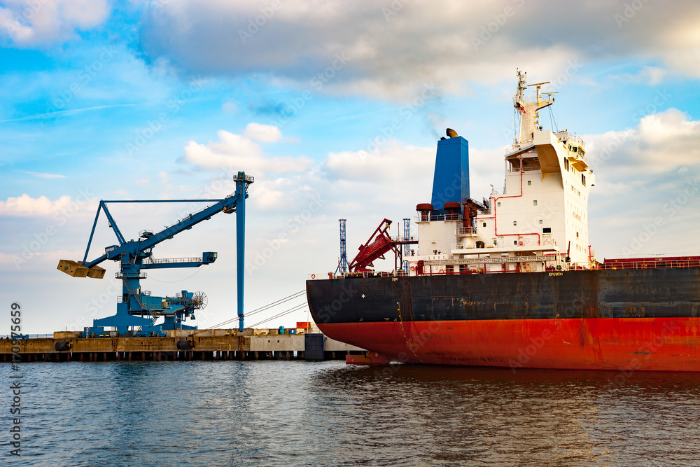 Cargo ship moored at the quayside in the port of Ggansk, Poland.