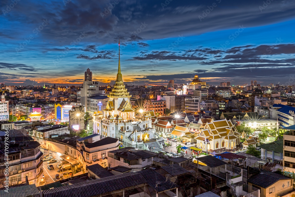 Wat Traimit , Traimitr temple of the Golden Buddha at twilight in Bangkok, Thailand