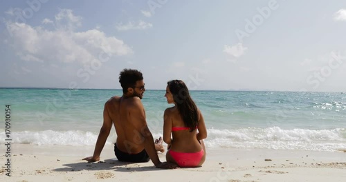 Happy Сouple Sit On Sand Beach Talking Back Rear View, Man And Woman In Love Communication Tourists On Summer Holiday Slow Motion 60
