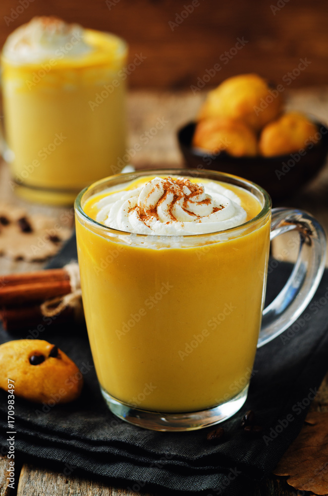 Pumpkin spice latte with whipped cream and pumpkin chocolate chips cookies Pumpkin spice latte with whipped cream and pumpkin chocolate chips cookies