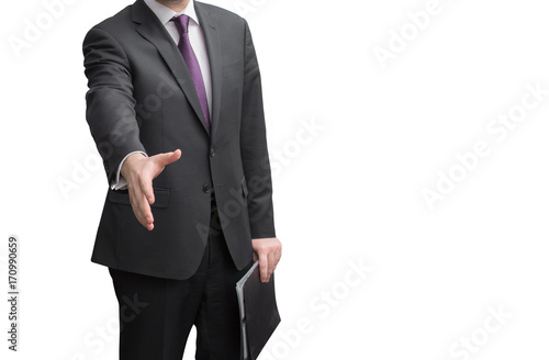 An unknown businessman with open hand ready to seal a deal on white background. Focus on a hand.