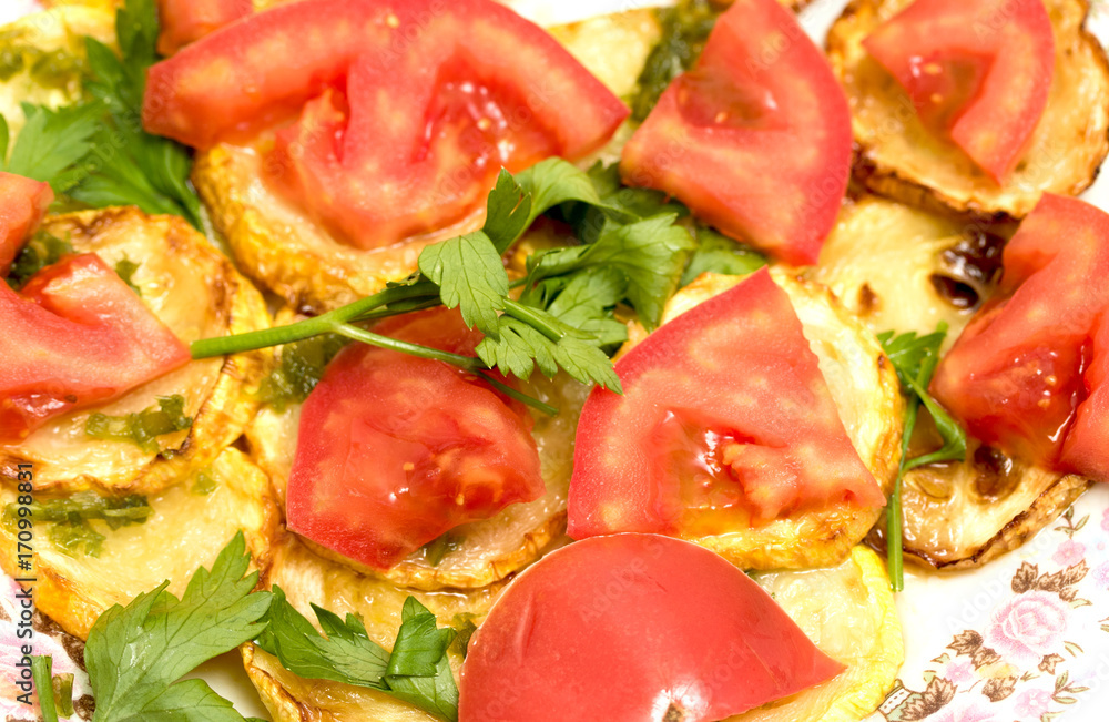 Fried zucchini and tomato food salad