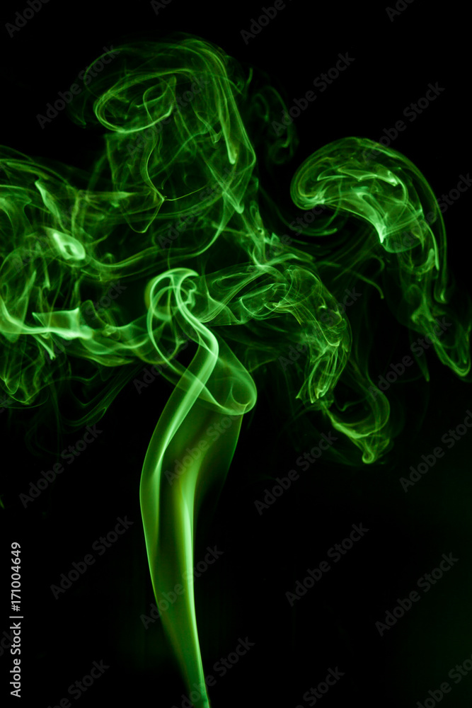 Green smoke movement on black background. Green smoke movement on black background.