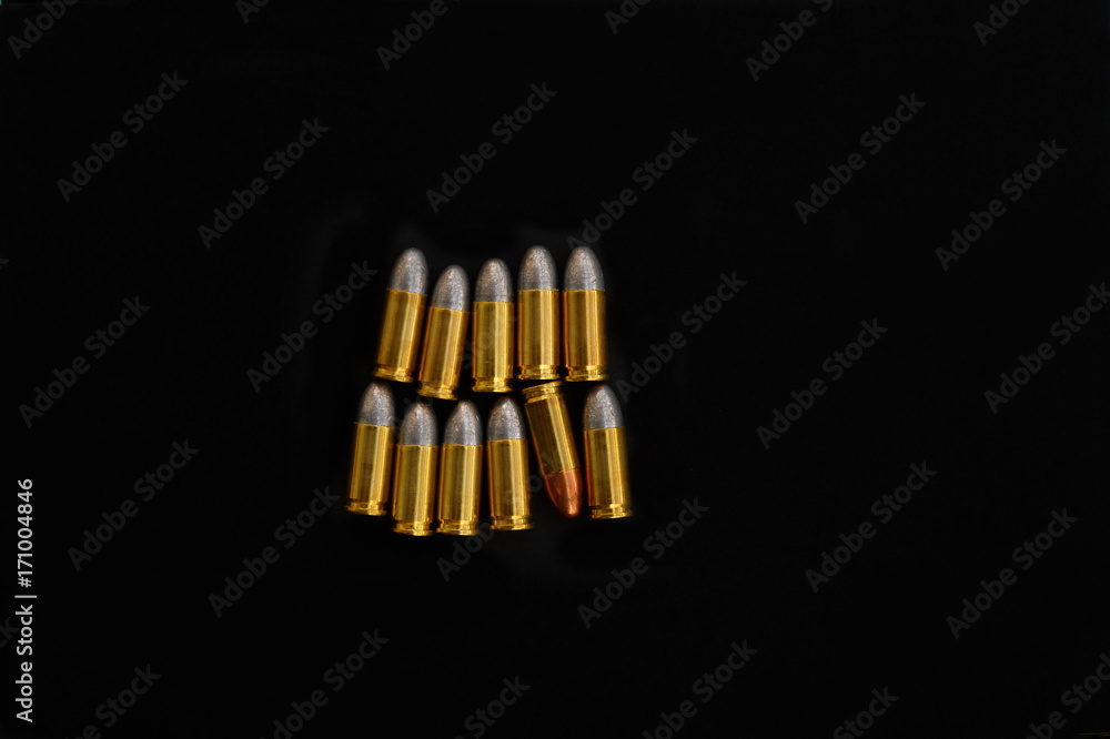 isolated 9 mm gun metal bullet for war security on black background isolated 9 mm gun metal bullet for war security on black background