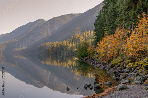 Fall colors at Lake Crescent located 18 miles west of Port Angeles in the Olympic mountain foothills of Olympic National Park, Washington photo