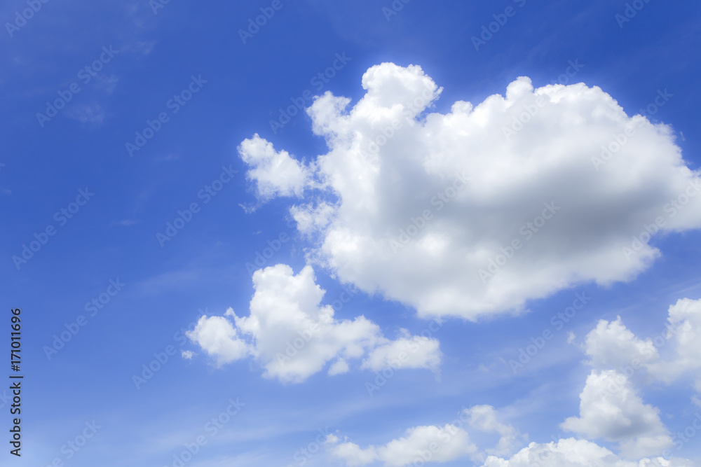 Fototapeta premium Blue sky background with beautiful white clouds.