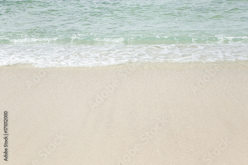The beach is clean white sandy beach. © popetorn