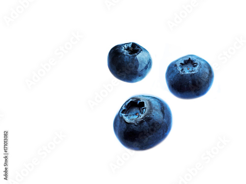 Small fruit of blueberries, moorland harvest isolated on white background. Vaccinium uliginosum (bog bilberry, bog blueberry, northern bilberry or western blueberry) soaring in the air