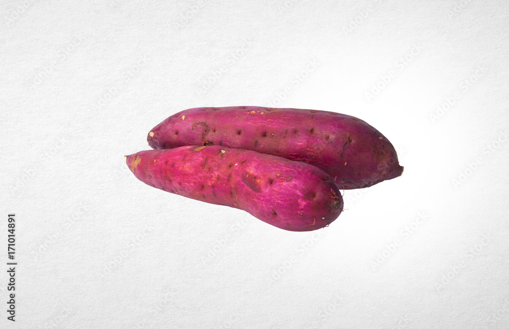 sweet potato or red sweet potato on a background. sweet potato or red sweet potato on a background.