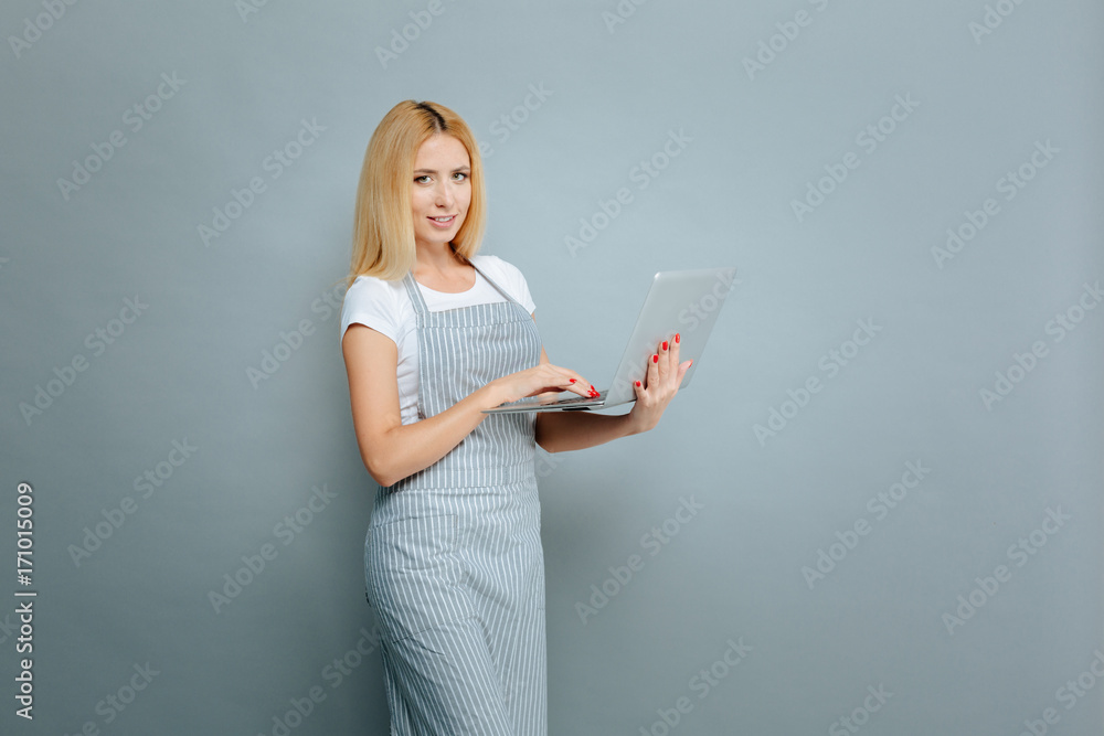 Serious young woman standing in semi position Serious young woman standing in semi position