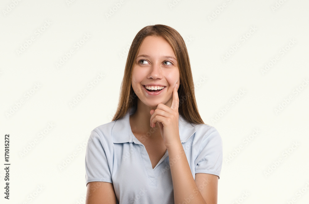 Beautiful woman looking away. Casual girl smiling portrait. Young attractive woman. Studio shot. Beautiful woman looking away. Casual girl smiling portrait. Young attractive woman. Studio shot.
